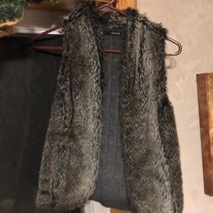 Faux fur vest small with sweater material back